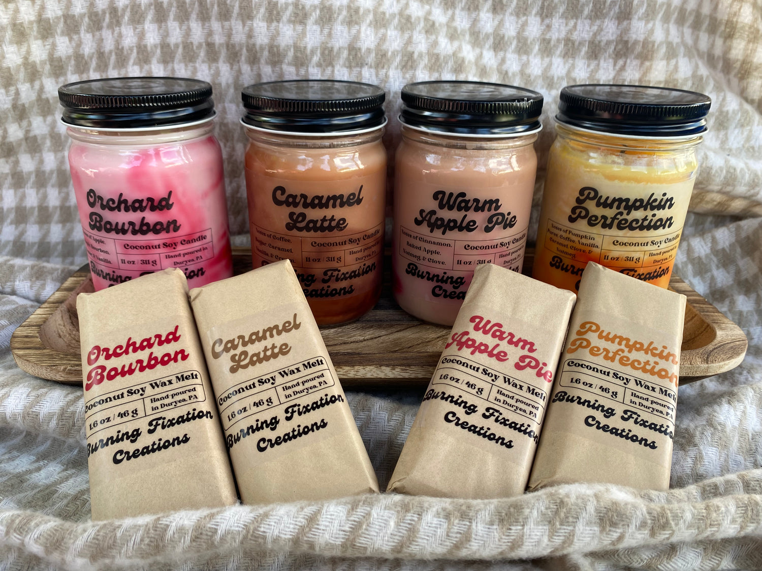 4 candles and 4 snap bar wax melts Orchard Bourbon (apple maple bourbon), Caramel Latte, Warm Apple Pie, and Pumpkin perfection.